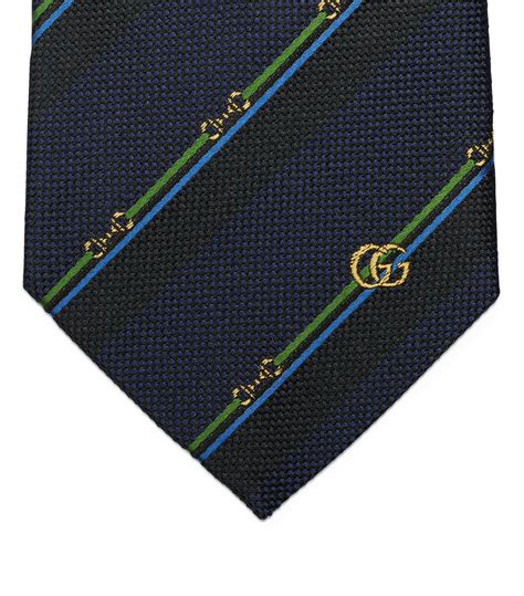 gucci tie with horseshoes blue|Horsebit silk jacquard tie in navy and blue .